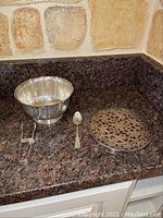 All four items displayed on granite countertop