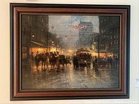 Full view of framed artwork on wall