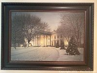 Overall view of framed print showing snow-covered White House scene