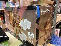 Photo showing front side of the Casablanca 19th Century ceiling fan box with image of fan and light fixture with three frosted glass shades.