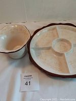 Image showing side view of removable floral lace designed dip bowl with brown scalloped edge.