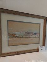 Framed painting shown from front angle with label 90.