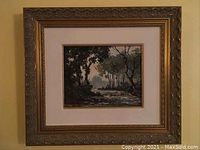 Full view of framed oil painting on board showing river scene in wooded landscape