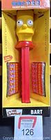 Photo of the boxed Giant Talking Bart Simpson PEZ dispenser showing front and packaging including candy rolls.