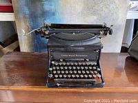 Front view of the Underwood Noiseless typewriter showing the keyboard and branding details.