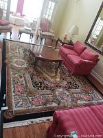 Full view of rug under living room furniture showing overall pattern and size