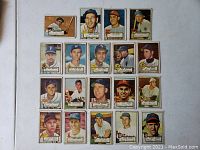 Overall group of 19 Topps cards laid out in four rows on white background