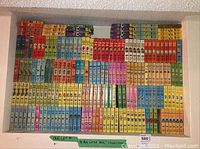 Full shelf view of hundreds of colorful spines labeled “A Big Little Book” showing multiple titles