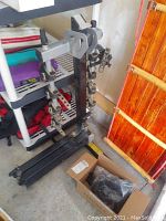 Full bike carrier rack with four adjustable bike clamps, black metal frame, and hitch mounting base.