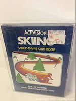 Front view of sealed Activision Skiing video game cartridge box for Atari 2600 showing colorful skier graphic and branding.