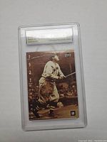 Front of graded Babe Ruth card showing player image, year and branding