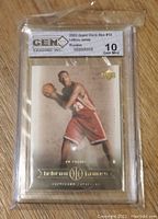 Front view of the 2003 Upper Deck LeBron James rookie card graded 10 Gem Mint in protective case, showing card image and grade label.