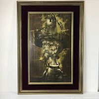 Full front view of framed art print showing Don Quixote with windmill hat inside a crackled gilt frame with red velvet matting and gilt trim.