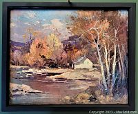 Framed oil painting full view against neutral background