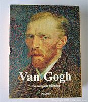Slipcase with Van Gogh's self-portrait artwork on front and text Van Gogh The Complete Paintings by Taschen.