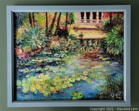 Framed oil on canvas landscape garden painting with lily pads, signed lower right.
