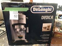 Boxed DeLonghi Dedica espresso machine