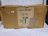 Closed cardboard shipping box featuring Mind Reader branding and product label for COOKCAN3-SIL 3-piece metal canister set for garlic, onion, and potatoes in silver.