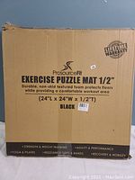 Box of ProsourceFit Exercise Puzzle Mat with product and dimension details visible