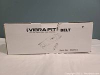 Photo of the Vibra Fit Belt box showing the brand, illustration of the belt, and item number.