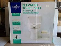 Box front side showing product usage and brand Medline. The elevated toilet seat with lock shown installed on a standard toilet in white.