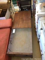 Overhead view showing wood and glass half top and lower shelf