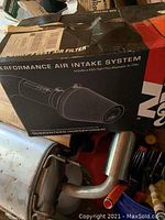 K&N Performance Air Intake System in original box showing product illustration.