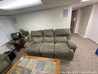 Front view of the 3 seater microfiber sofa showing overall condition and wear.