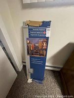 Full packaged box of Lee Rowan wardrobe organizer showing the branding and product image.