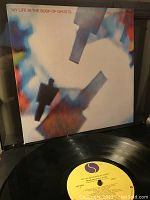 Front cover of 'My Life in the Bush of Ghosts' vinyl album with visible vinyl record showing label.