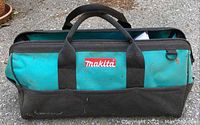 Closed soft carry case with Makita logo, showing exterior condition.