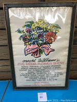 Front side of framed poster featuring colorful floral bouquet with text promoting Mashel Teitelbaum's 1974 Five Media Flower Show exhibition in Toronto, signed limited edition poster.