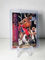 Front of Allen Iverson Stadium Club Rookie basketball card showing player action photo and 'ROOKIE' text.