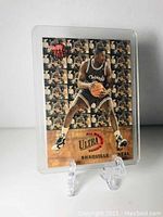 Front side of Shaquille O'Neal 1992-93 Fleer Ultra rookie card in protective plastic case.
