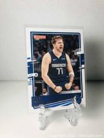 Front side of the card showing Luka Doncic in a Dallas Mavericks jersey in action pose with Donruss 2020 branding.