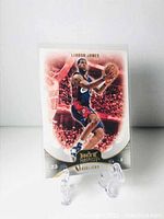 Front side of LeBron James Hot Prospects basketball card showing him in Cleveland Cavaliers uniform.