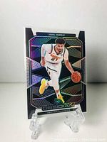 Front of 2019-2020 Panini Obsidian Jamal Murray basketball card showing holographic design and player image in Denver Nuggets uniform.