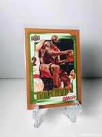 Front of 2008-09 Upper Deck Team MVP LeBron James basketball card showing action photo and design