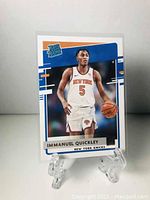 Front of Immanuel Quickley rookie card showing player image and team details