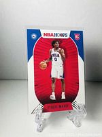 Front of Tyrese Maxey rookie card showing player image and logos.