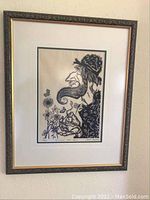 Framed limited edition woodcut print 'Gimpez the Fool' by Morton Garchik, visible frame and matting.