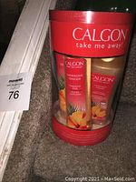 Front view of the Calgon Hawaiian Ginger gift set showing all three items inside cylindrical packaging.