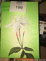 Box with Fruits & Passion Jasmine flower artwork and label showing lot number