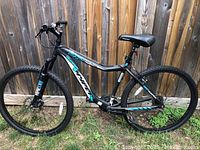 Full side view showing frame, wheels, suspension and overall condition