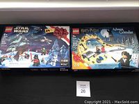 Front view of Lego Star Wars Advent Calendar 75279 with 311 pieces and Lego Harry Potter Advent Calendar 75981 with 335 pieces.