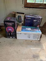 Photo showing all boxes: 20" Plasma Ball, mailbox, and Campbell Hausfeld air hose