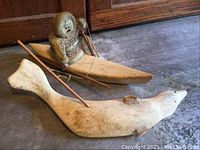 Overview of both bone carvings on floor