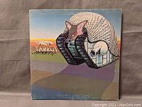 Front cover of Emerson, Lake & Palmer "Tarkus" album showing armadillo-tank artwork.