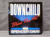 Front cover of Downchild Blues Band 'Blood Run Hot' vinyl record album featuring Spencer Davis.