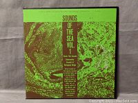 Front cover of the Sounds Of The Sea Vol. 1 vinyl record showing green and brown textured artwork and title text.